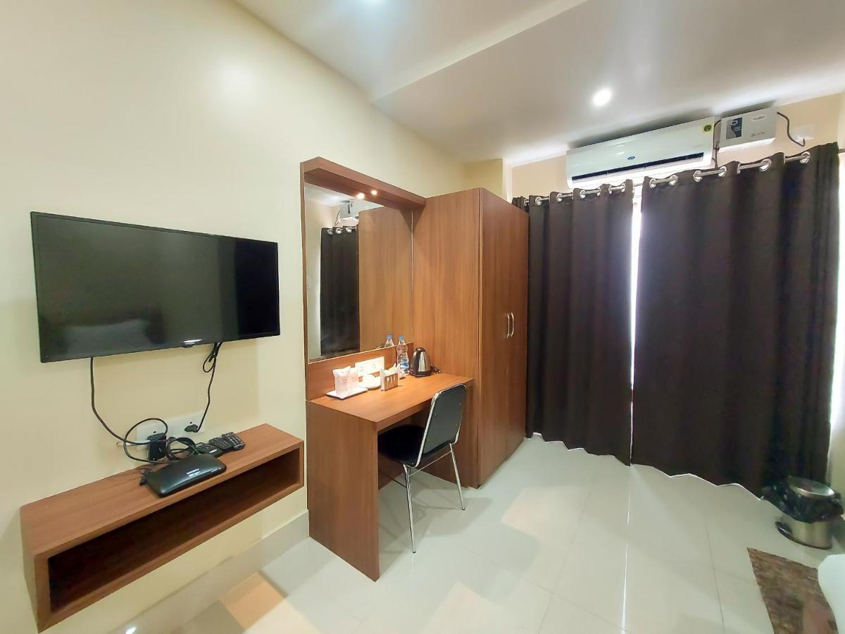 Hotel Bliss Jorhat Bagian luar foto