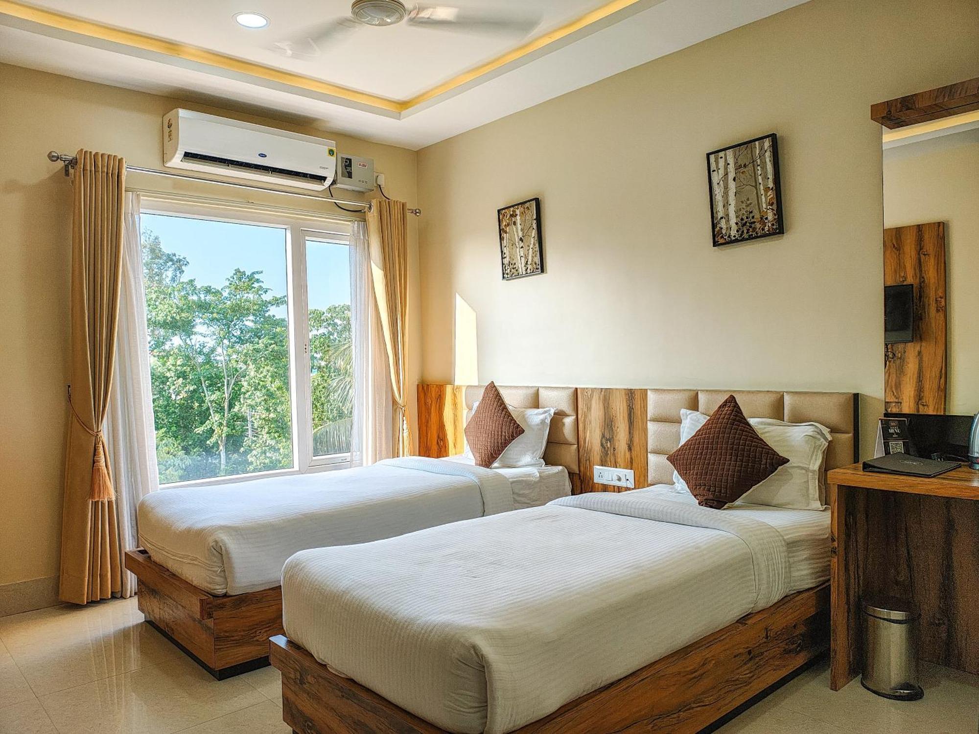 Hotel Bliss Jorhat Bagian luar foto